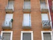 Milano - edificio condominiale, porte scorrevoli ignifughe originali (legno ricoperto di amianto)
